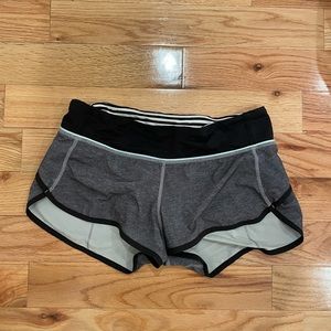 Lululemon Run Speed Up Short in grey, hot pink, turquoise blue, and black